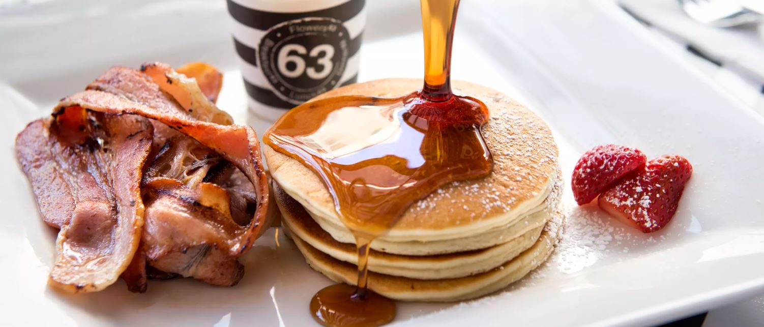 Cafe 63 bacon, pancakes and coffee with maple syrup at Westfield Carousel - A Lighting Options Australia project.